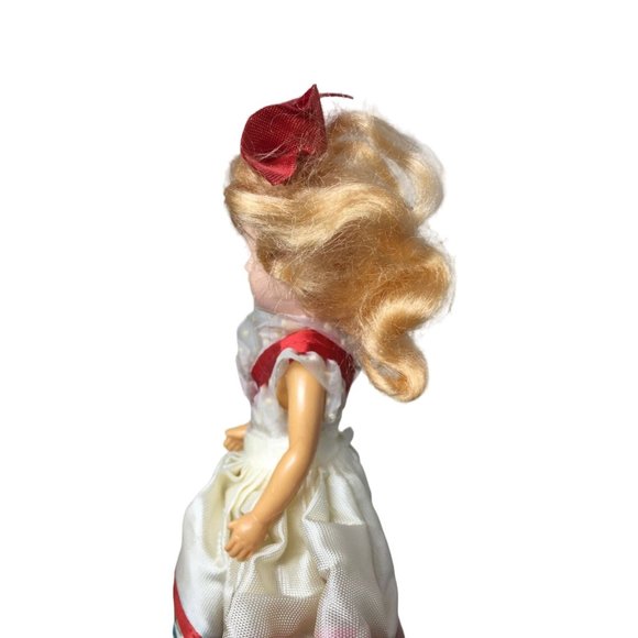 Vintage Collectible Doll With Blonde Hair wearing floral printed dress/red bow - Picture 4 of 8